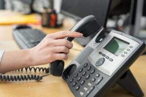 close up person working call center - How to Find Telephone Prefix for a City in Any Country 35